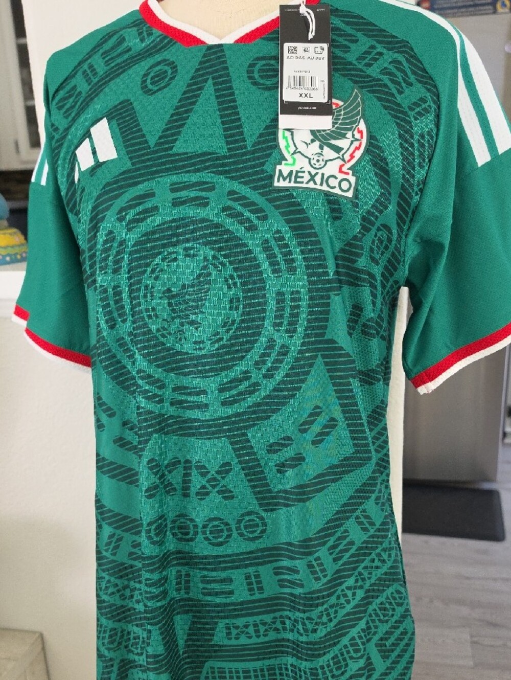Green Soccer Jersey with Red and White Trim - Picture 7 of 11